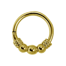 Load image into Gallery viewer, 24k gold PVD surgical steel hinged clicker ring with three balls and a wrapped wire design 1.0x6mm