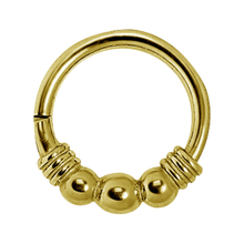 Load image into Gallery viewer, 24k gold PVD surgical steel hinged clicker ring with three balls and a wrapped wire design 1.0x7mm