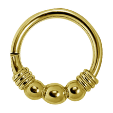 Load image into Gallery viewer, 24k gold PVD surgical steel hinged clicker ring with three balls and a wrapped wire design 1.0x8mm