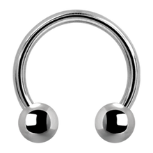 Load image into Gallery viewer, A titanium circular barbell with two externally threaded balls designed for various body piercings.
