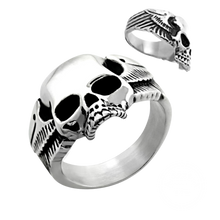 Load image into Gallery viewer, A high polished stainless steel ring with a skull and wings design, displayed from two different angles.