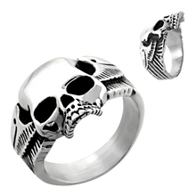 Load image into Gallery viewer, A high polished stainless steel ring with a skull and wings design, displayed from two different angles.