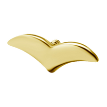 Load image into Gallery viewer, A 24k gold PVD titanium internally threaded attachment with a flat top shaped like a simple bird 
