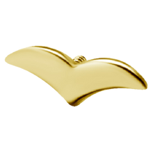 Load image into Gallery viewer, A 24k gold PVD titanium internally threaded attachment with a flat top shaped like a simple bird 
