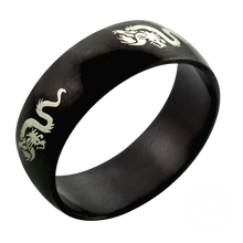Load image into Gallery viewer, A black steel band ring with a engraved dragon design.
