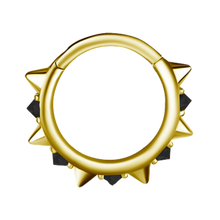 Load image into Gallery viewer, A gold-toned 18k Gold PVD cobalt chrome nickel free hinged ring decorated with multiple sharp conical spikes and clear upside down gemstones, shown on a plain white background.
