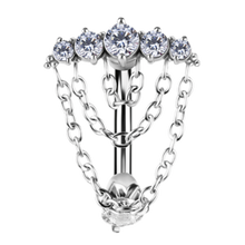 Load image into Gallery viewer, Silver colour surgical steel navel barbell with five prong-set cubic zirconia stones at the top and a 5mm prong-set cubic zirconia at the bottom. With 3 connected cascading chains. On white background
