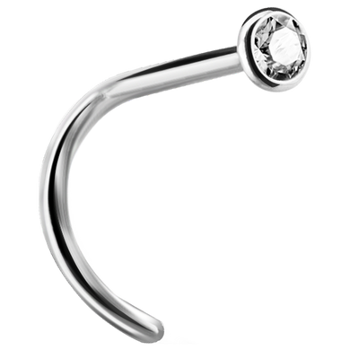 A curved nose stud with a bezel set crystal at the end.