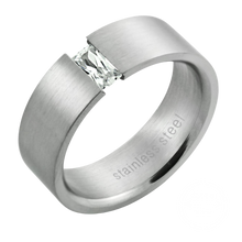 Load image into Gallery viewer, A matte polished stainless steel band ring with a central clear rectangular crystal.
