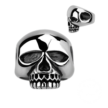 Load image into Gallery viewer, A silver-coloured ring with a large skull design on the top, resembling the style of the famous rock star Keith Richards.
