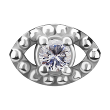 Load image into Gallery viewer, A silver-toned cobalt chrome nickel free  eye-shaped internally threaded attachment featuring a large round clear gemstone in the center, surrounded by textured raised dots around the eye shape, shown on a plain white background.
