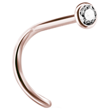 Load image into Gallery viewer, A curved nose stud with a bezel set crystal at the end.
