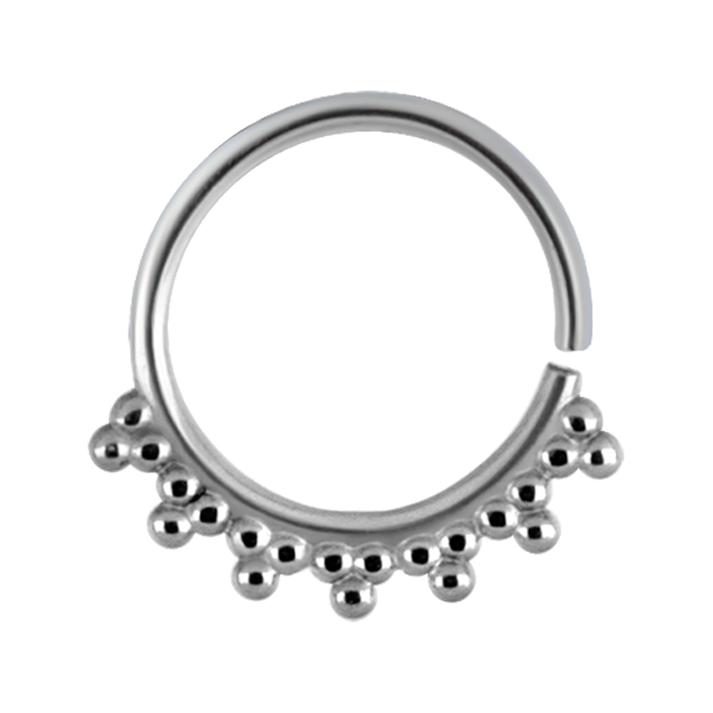 A surgical steel continuous ring with a granulated tribal design