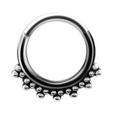 Load image into Gallery viewer, A steel tribal hinged ring with granulated details and a hinged center.
