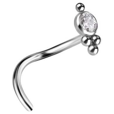 A titanium ASTM F-136 ornate nose twirl with a white premium zirconia stone