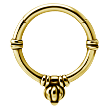 Load image into Gallery viewer, A 24k PVD gold surgical steel hinged ring jewellery with a geometric pattern and an acorn design on the hinge.
