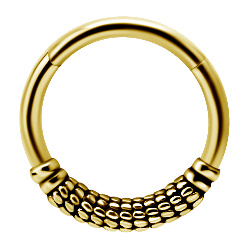 A single 24k gold PVD steel hinged ring with a patterned design, suitable for use as body piercing jewellery.
