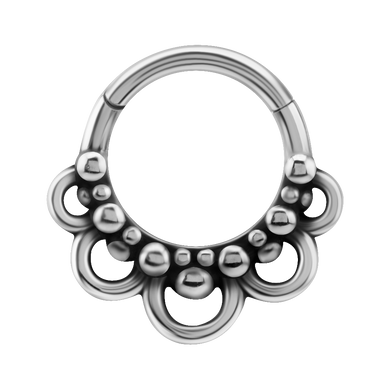A surgical steel Boho Hinged Ring with multiple protrusions and a circular shape designed for use in various piercings.