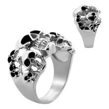 Load image into Gallery viewer, A silver steel ring with a pattern of black skull designs.

