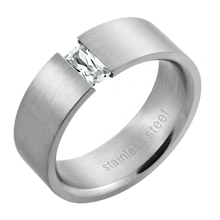 Load image into Gallery viewer, A matte polished stainless steel band ring with a central clear rectangular crystal.
