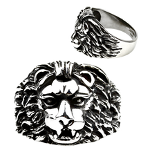 Load image into Gallery viewer, A stainless steel ring with a lion's face design, presented from two angles showing the profile and top view.
